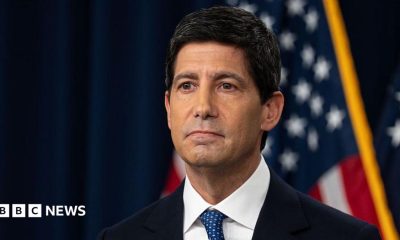 Kevin Warsh, chairman of the Federal Reserve, taking questions at a press conference in Washington DC on 16 September. He is wearing a dark navy blue suit with a white shirt and blue-spotted tie.