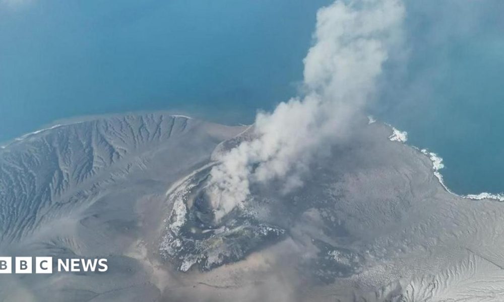 Mount Anak Krakatau spewing volcanic materials into the air following an eruption in Sunda Strait, Indonesia