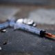 Needles littering the pavement in a lane in Glasgow