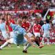 Manchester City striker Erling Haaland scores against Manchester United
