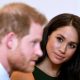 Britain's Prince Harry and his wife Meghan Markle are pictured.