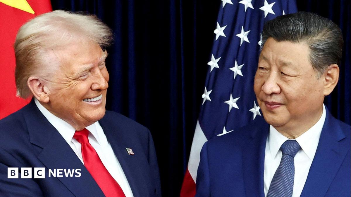 US President Donald Trump and Chinese leader Xi Jinping exchange smiles as they greet each other before a meeting.