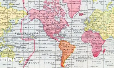 Side-by-side maps of Africa comparing two map projections. The Mercator projection on the left makes Africa appear smaller in comparison with Europe to its north. The Equal Earth projection on the right shows a longer, more proportionally accurate shape of the continent.
