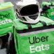 Delivery bags with logos of Uber Eats are seen on a street in central Kiev