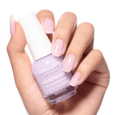 woman holds nail polish bottle from Gellen