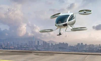 eVTOL Electric Vertical Take Off and Landing Aircraft About To Land Near City