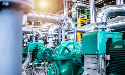 Interior view of an oil and gas petrochemical refinery plant with pipeline and valves. Industrial fuel production.