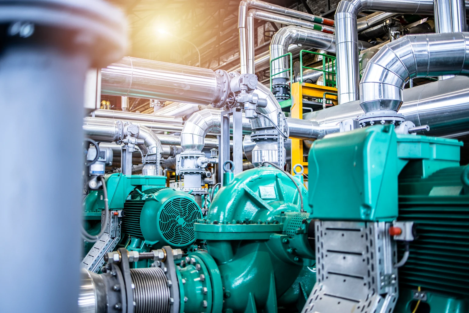Interior view of an oil and gas petrochemical refinery plant with pipeline and valves. Industrial fuel production.