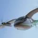 Electric VTOL passenger aircraft flying in the sky