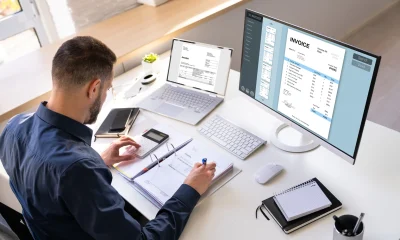 Accountant Using E Invoice Software At Computer