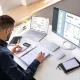 Accountant Using E Invoice Software At Computer