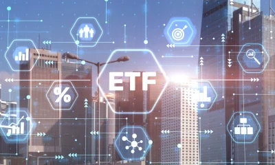 ETF Exchange traded fund Investment finance concept on city background