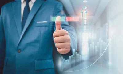 Stock market, Business growth, progress or success concept. Businessman or trader is showing a growing virtual hologram stock, invest in trading.