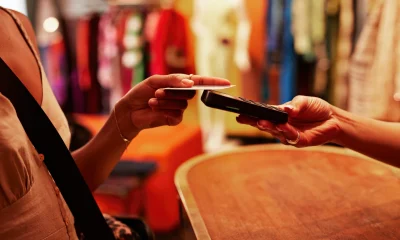 Woman paying through credit card in store