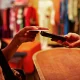 Woman paying through credit card in store