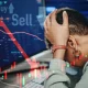 Woman, stress and banking of stock market, crash or financial crisis in overlay on computer. African, person and headache in trading, digital or fintech for lines, chart and money risk for investment
