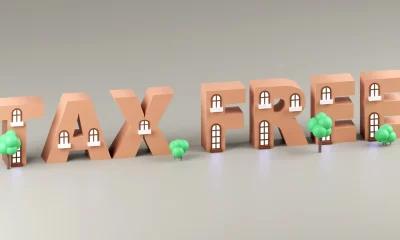 3d render sign tax free made of tiny houses and light background. Simple minimalism concept.