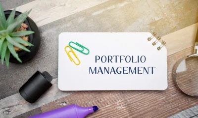 Portfolio management concept. Process of making investment decisions to achieve specific financial goals. business and finance. Inscription on a notepad