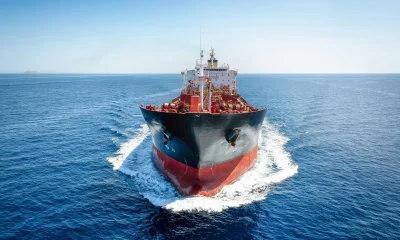 Front view of a chemical goods or oil tanker in motion