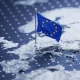Flag of European Union waving on pole on the 3d topographic map surface and abstract background with a grid