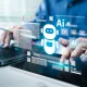 AI Artificial Intelligence technology for data analysis, research, planning, and work generate. Man uses a laptop and AI assistant dashboard. Technology smart robot AI agents and agentic workflows.