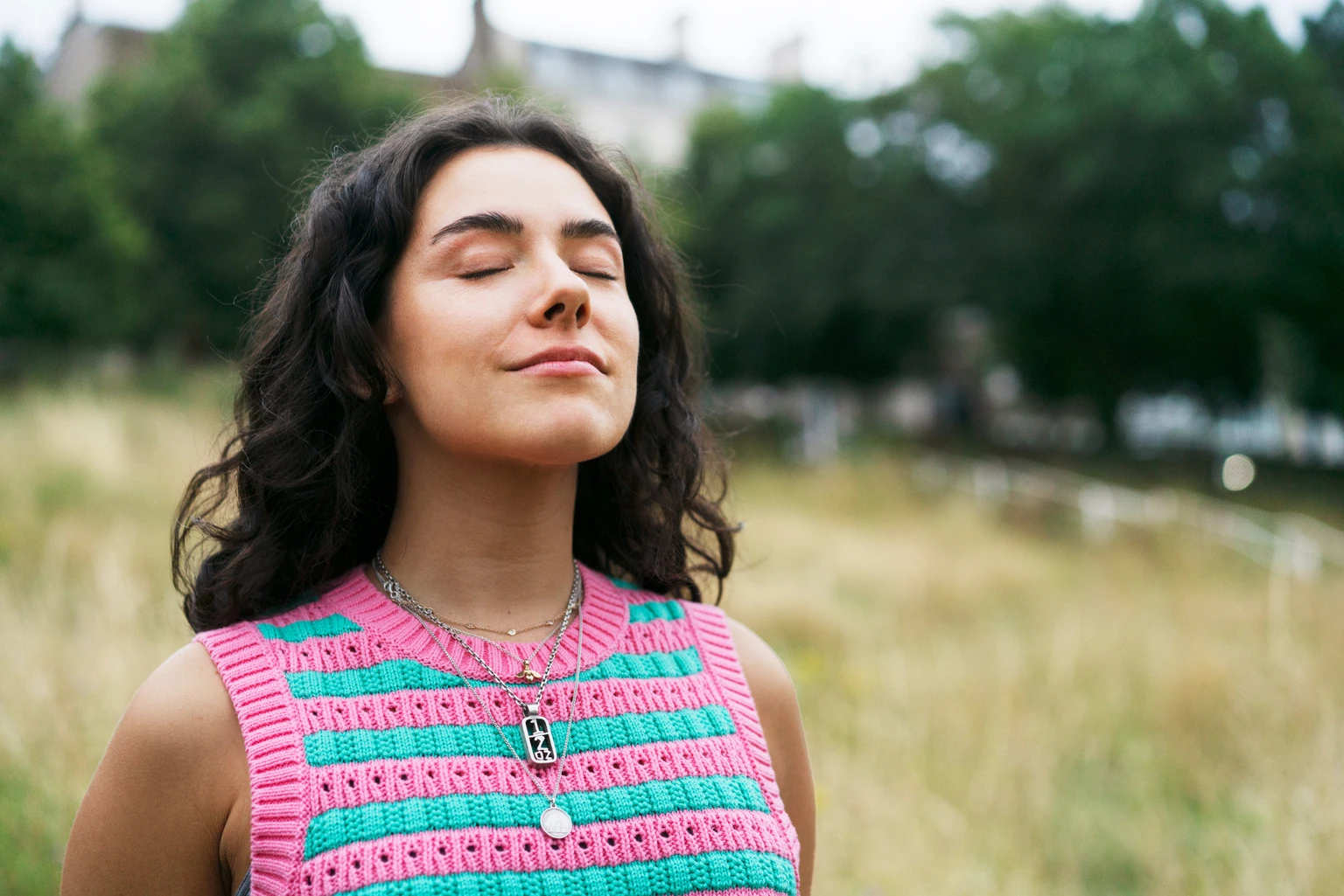 Woman with eyes closed, relaxed, mindfulness
