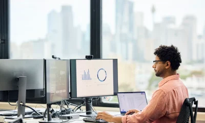Male business expert going through sales data