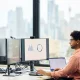 Male business expert going through sales data