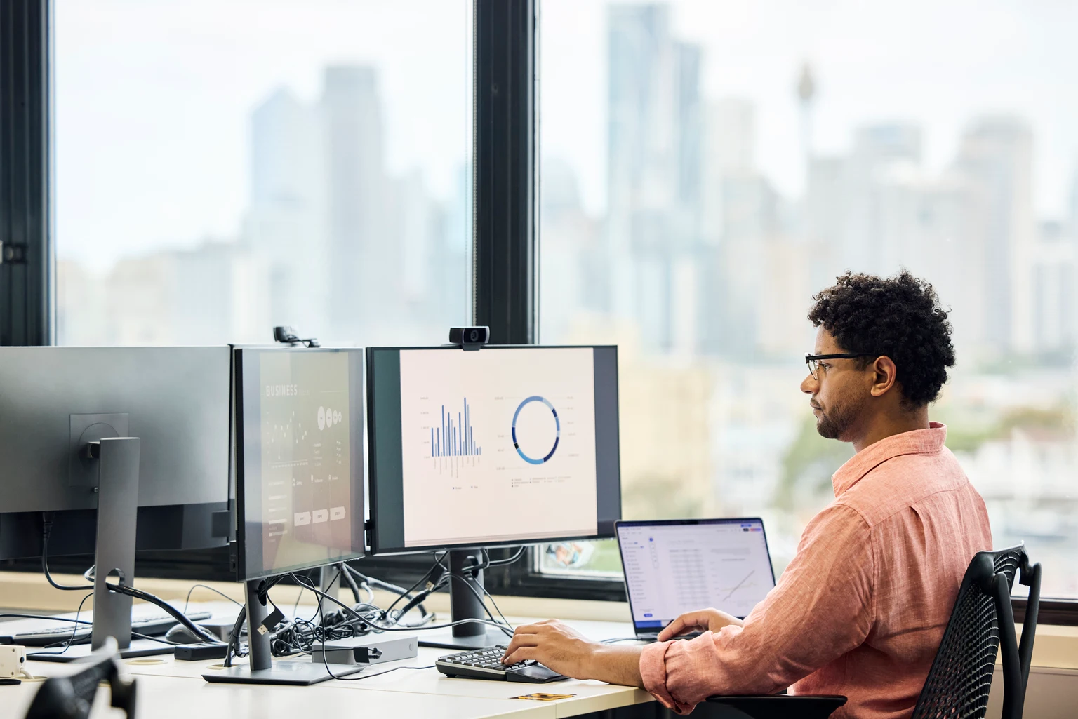 Male business expert going through sales data