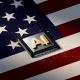 Innovation Engine: Conceptual AI Chip Displayed on American Flag Surface