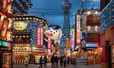 Osaka Twilight People Walking in Shinsekai Tsutenkaku Tower in the Background Japan