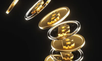 Futuristic Golden Bitcoin Coins on dark background 3D Digital Cryptocurrency Concept