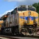 Union Pacific freight train locomotive in closeup working intermodal cargo