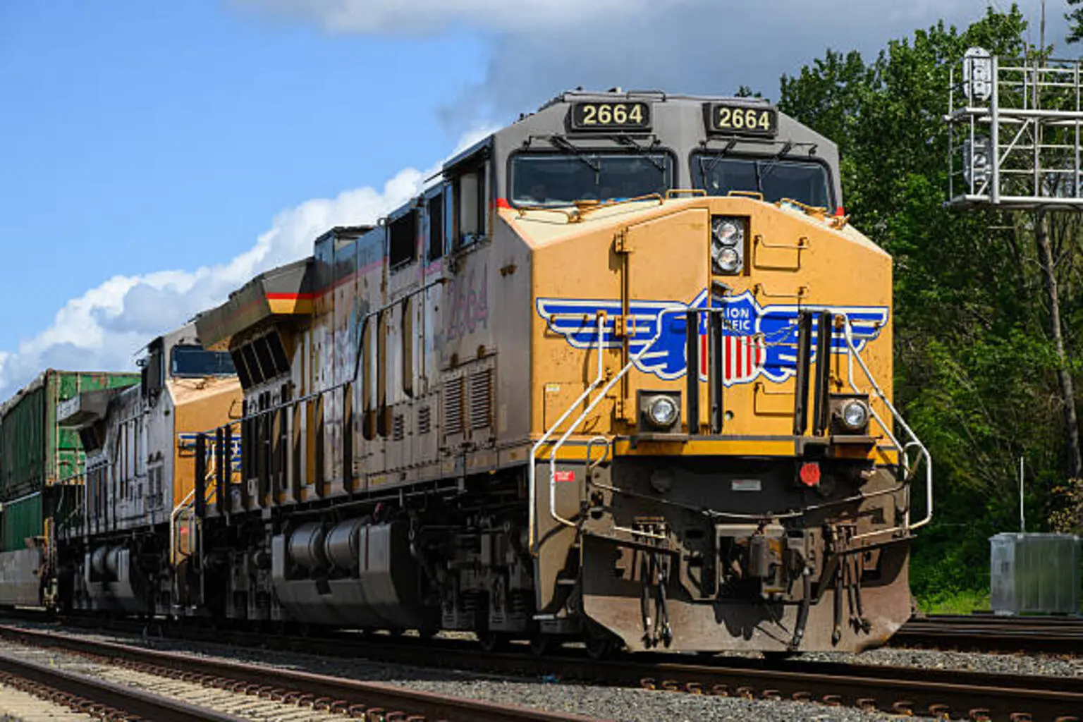 Union Pacific freight train locomotive in closeup working intermodal cargo