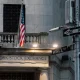 Grand financial building standing at corner of heritage-filled district