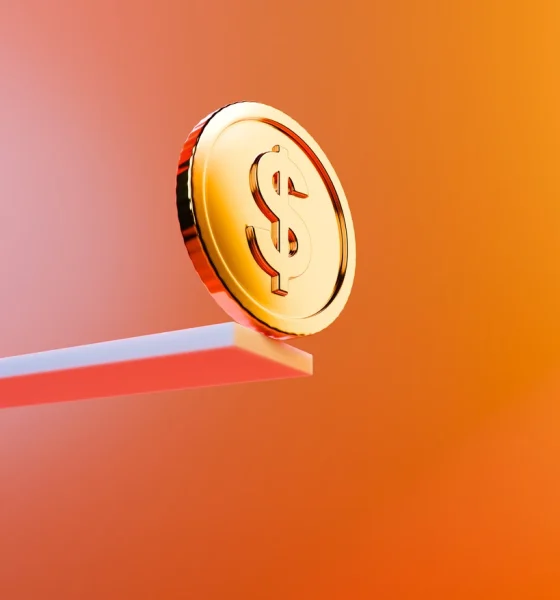 Golden Dollar Coin on Edge - Precarious Financial Trust Concept
