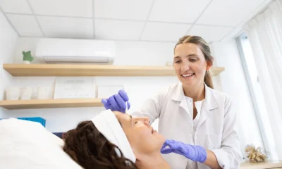 A dermatologist applying a collagen biostimulator to her patient
