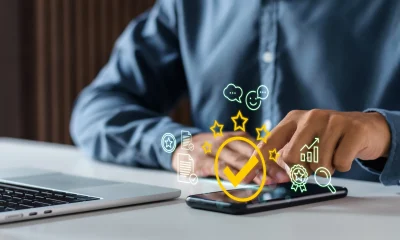 Executive tracking consumer review metrics and high customer satisfaction scores