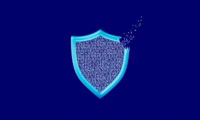Binary Code Shield Leaking Data on Dark Blue Background Symbolizing Cybersecurity Breach