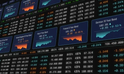 Global bond market trading screen, governemnt bond interest rates, charts, prices, stock market theme.