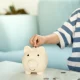 Save money. children putting coin for saving. wealth, Finance, insurance, investment, education, future, plan life, learn, banking, family, health, health and accident insurance.