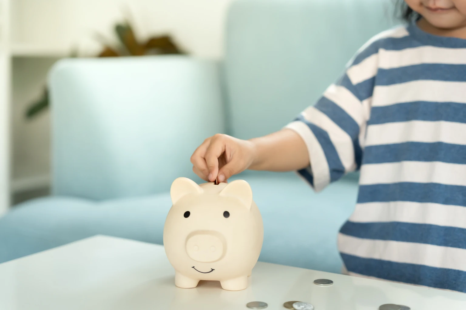 Save money. children putting coin for saving. wealth, Finance, insurance, investment, education, future, plan life, learn, banking, family, health, health and accident insurance.