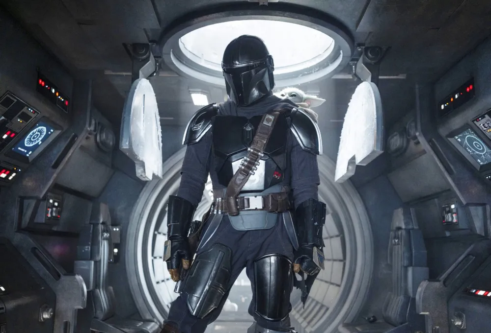 Pedro Pascal and Grogu in Star Wars: The Mandalorian and Grogu