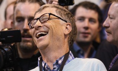 Microsoft founder and technology advisor Bill Gates laughs at a trade show during the Berkshire Hathaway annual meeting in Omaha.