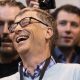Microsoft founder and technology advisor Bill Gates laughs at a trade show during the Berkshire Hathaway annual meeting in Omaha.