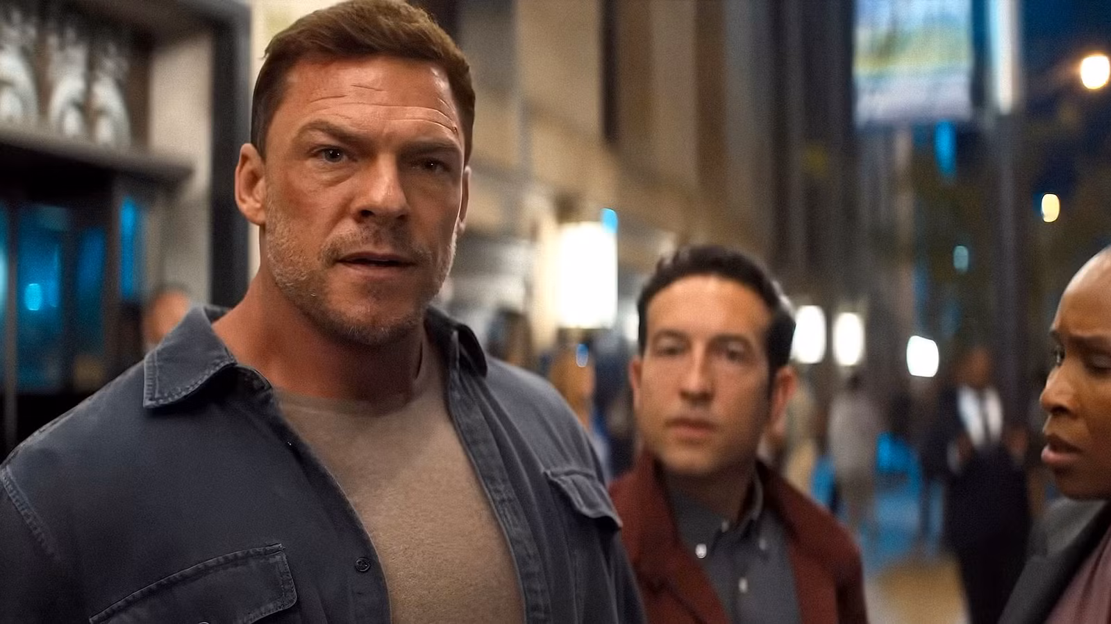 Reacher, Jacob, and Tamara on the street in 'Reacher' Season 4.