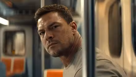 Reacher looking intently to his left