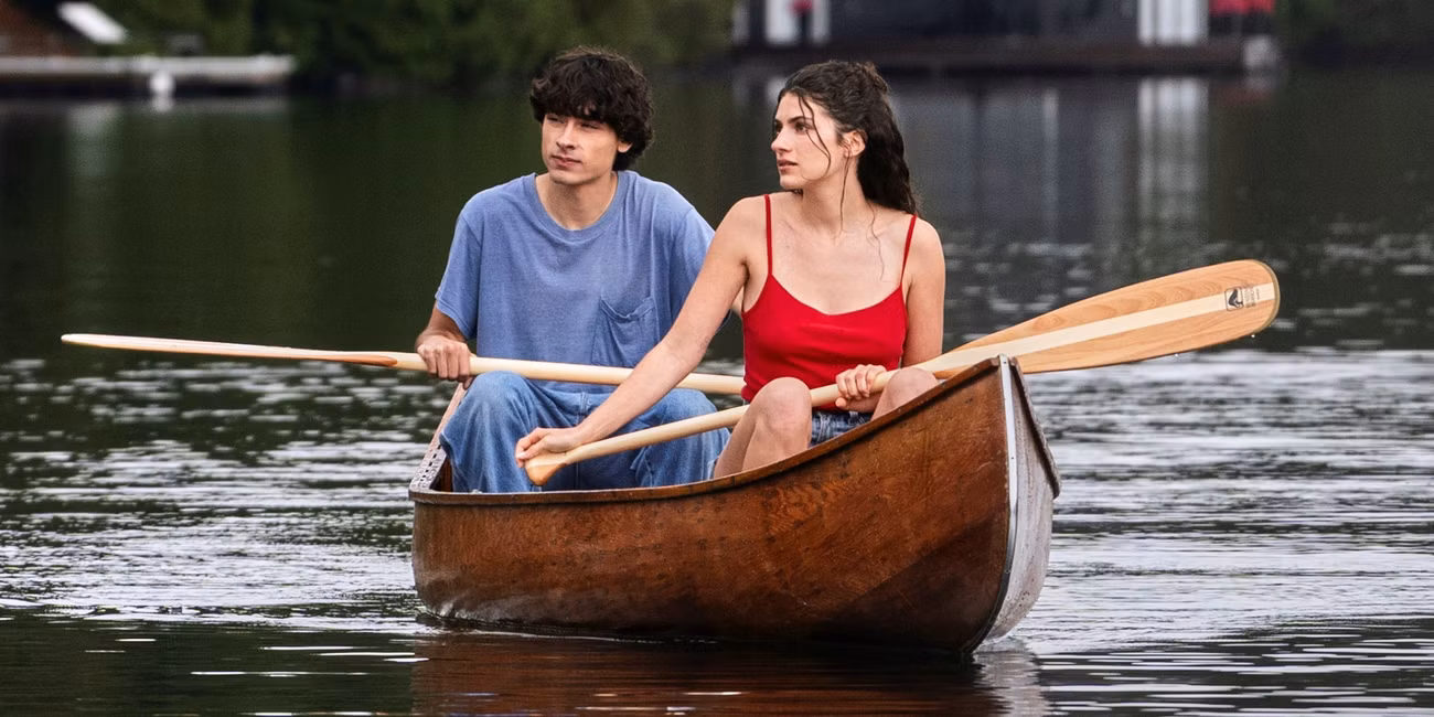 Ella Rubin as Annie sitting in a boat on the lake with Jacob Whiteduck-Lavoie as Ellis in Sterling Point