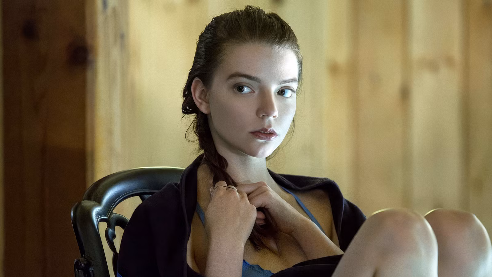 Lily sitting in a chair in Thoroughbreds.