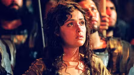 Rose Byrne looking up surrounded by soldiers in 'Troy'